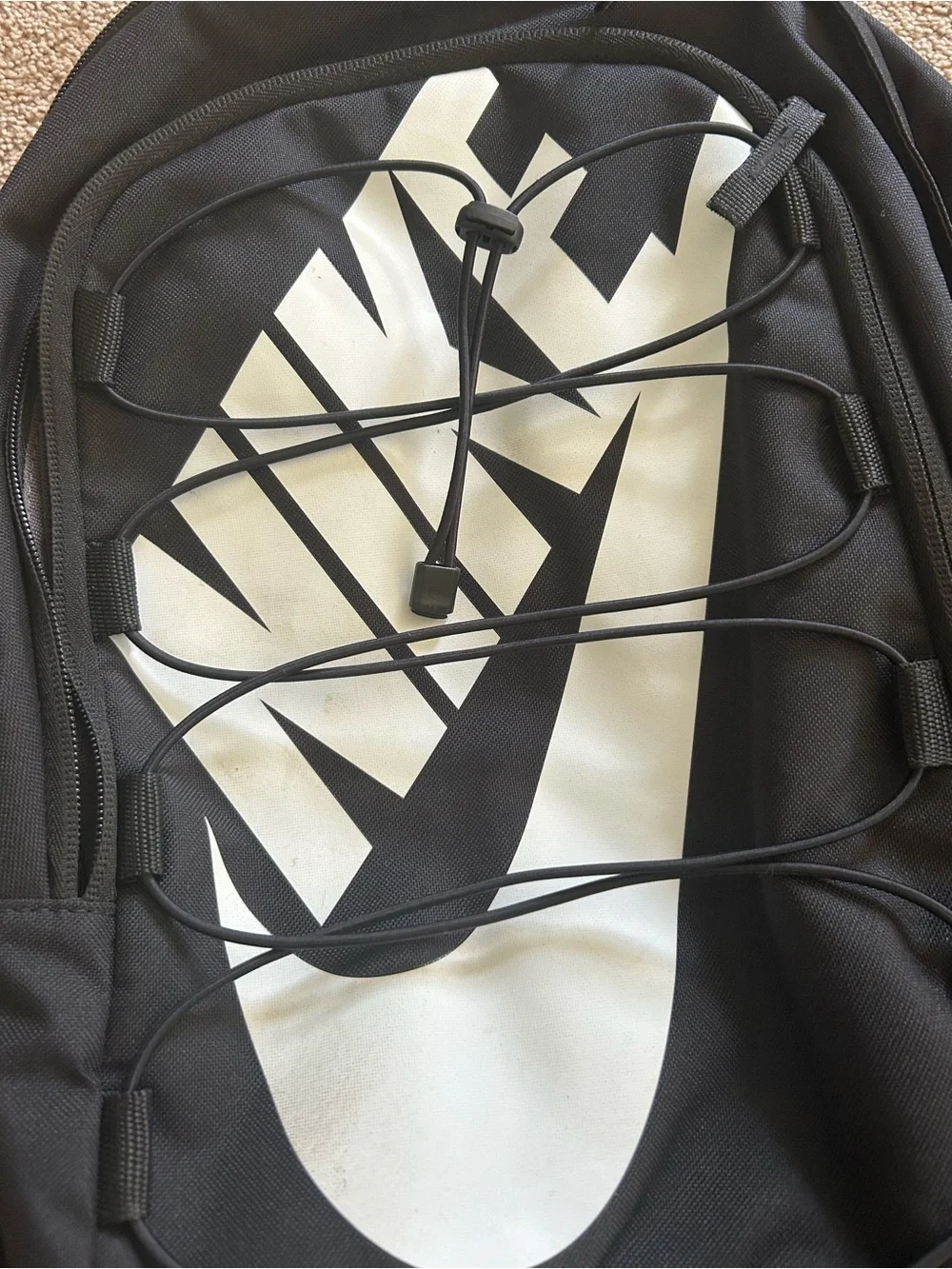 Nike Black Backpack with White Logo and Bungee Front